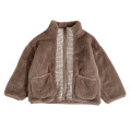 Jersey infantil de lana de cordero con costuras